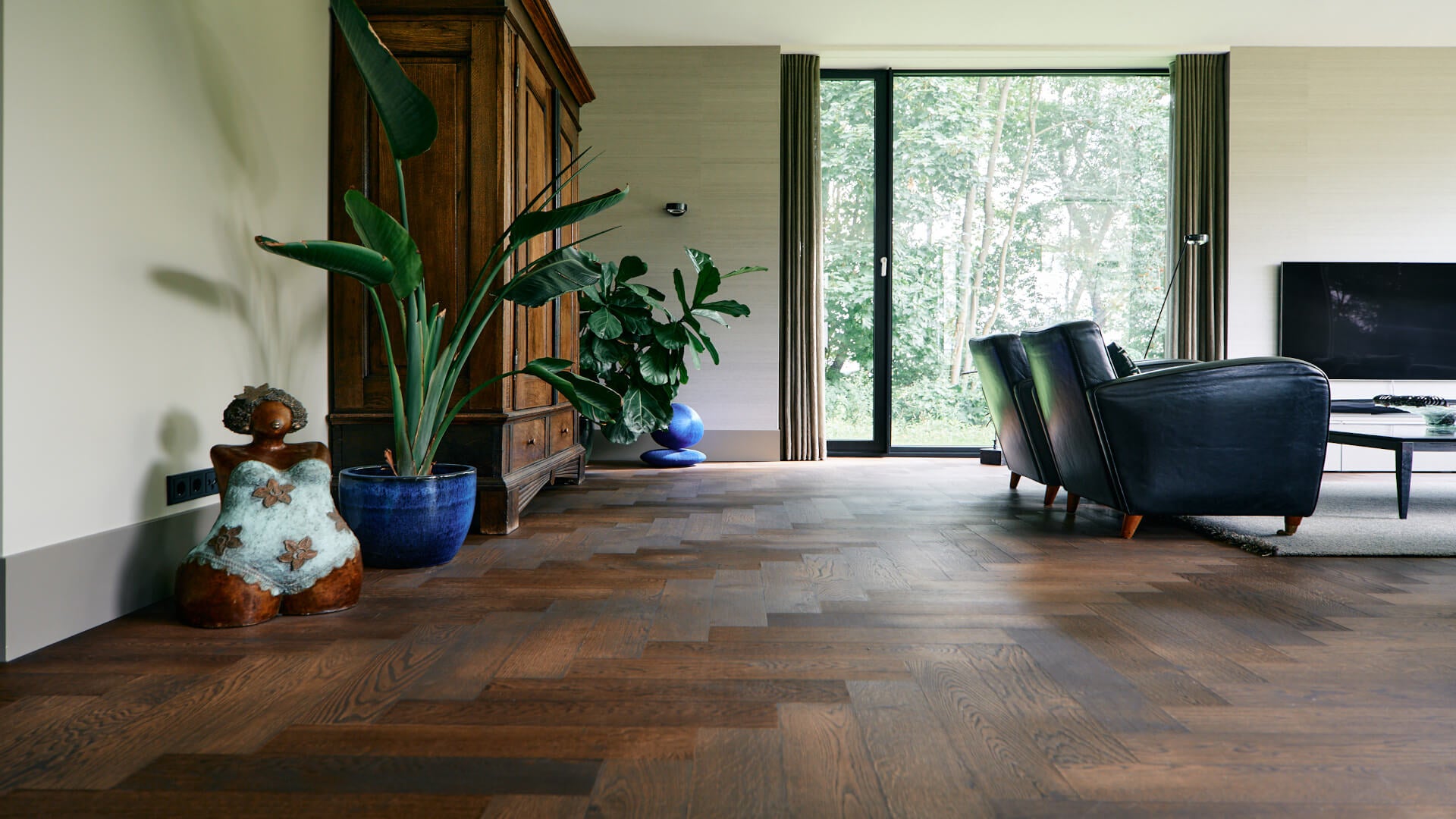 elleboog patroon houten vloer woonkamer